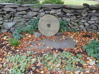 Mill stone at Pestilence Cottage Woodhouse, former school founded by Thomas Rawlins