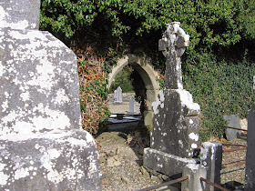 Old graveyard outside church ruins at Ballina in County Tipperary in Ireland