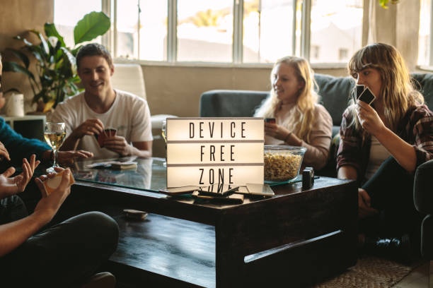 digital detox- friends playing cards at device free zone