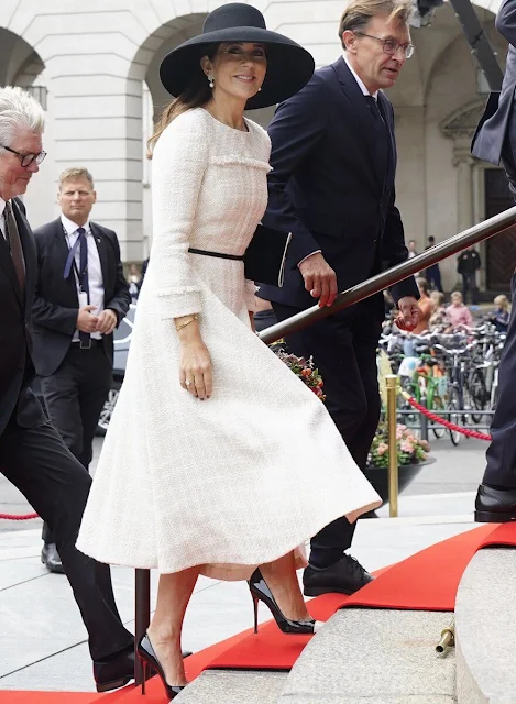 Crown Princess Mary wore an ivory tweed midi dress by Mark Kenly Domino Tan. Gianvito Rossi and Diane von Furstenberg