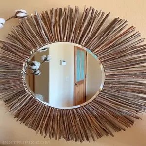 espelho decorativo rústico com galhos secos.