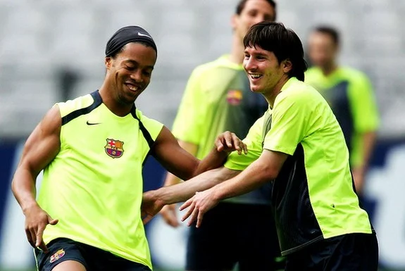 Ronaldinho was a key figure in helping Lionel Messi settle into the Barcelona team