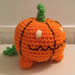 http://www.ravelry.com/patterns/library/amigurumi-pet-pumpkin