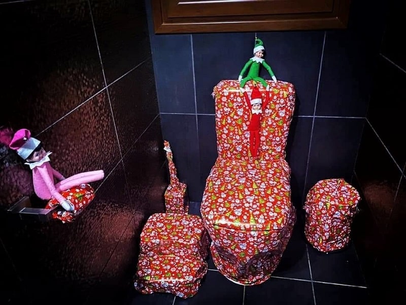 cheeky elves christmas wrapped the toilet