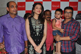 Kajal Aggarwal in lovely Black Sleeveless Anarlaki Dress in Hyderabad at Launch of Bahar Cafe at Madinaguda 011.JPG