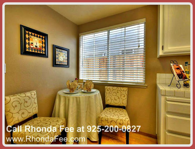 Open up a bottle of wine and enjoy precious quiet moments in this little corner in the      kitchen of this elegant Pleasanton luxury home. 