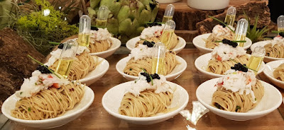 Tasting portions of cold capellini pasta with Alaskan crab, ebi caviar and truffle vinaigrette at the media preview session.