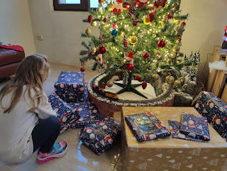 Rosie, her presents, and the tree