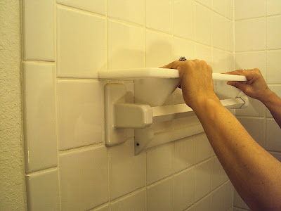 shower shelf fits over shower towel bar