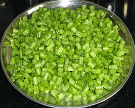 cut beans into pieces to make Farasbi batata bhaji