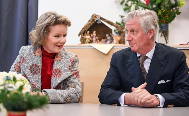 Queen Mathilde wore a felt embroidered jacket by Carnet Como. ASBL Francoise Schervier rest and care home in Chaudfontaine