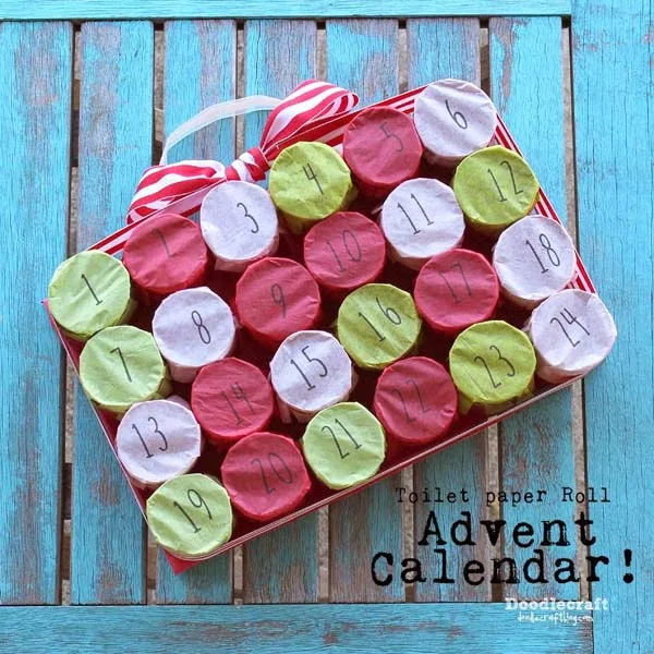 Make a punch box advent calendar using toilet paper rolls, tissue paper, hot glue and ribbon!