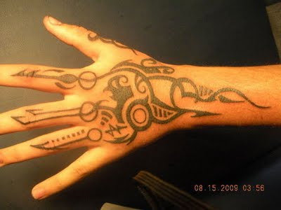 Tribal Art Tattoo Design on hand. RANDOM TATTOO QUOTE: "But to become a