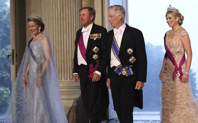 Queen Maxima wore a new gown by Jan Taminiau. Stuart Diadem and sea green Stuart diamond. Queen Mathilde