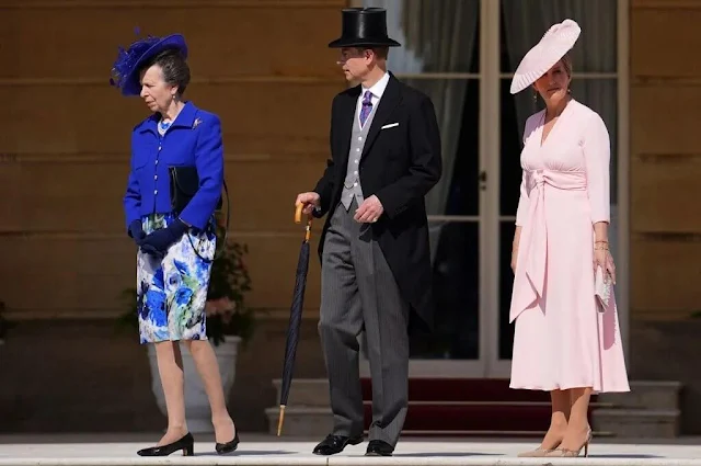 Duchess of Edinburgh wore a salmon pink wrap dress by Suzannah. Princess Anne floral print dress, Duchess of Gloucester gray dress