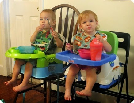 Twins Eating with Utensils
