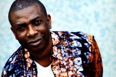 "Lirik Lagu Youssou N'Dour - In Your Eyes"