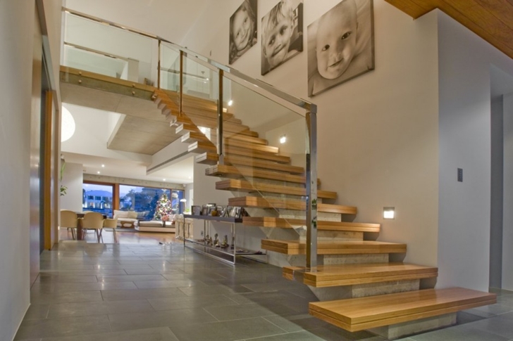 Modern stairs in Modern house at Amalfi Drive by BGD Architects