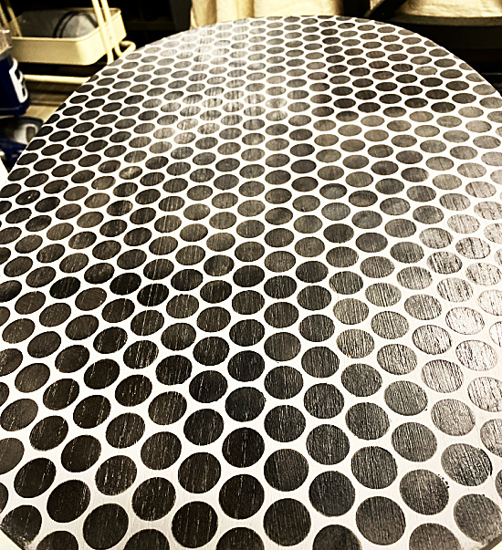 black circles on oval table