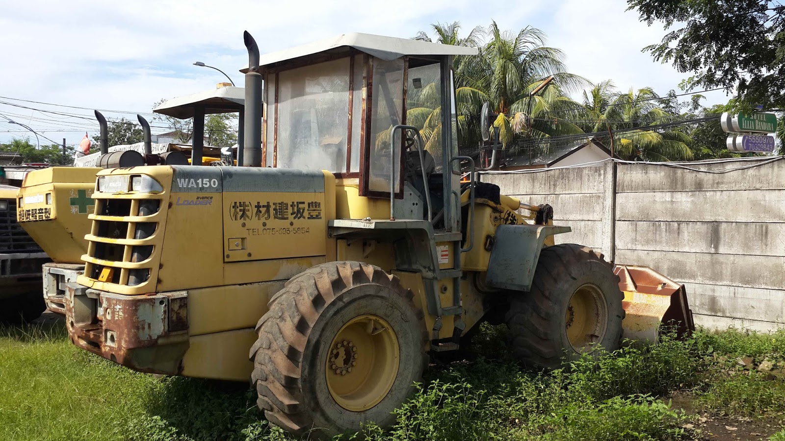 PENENTUAN FAKTOR EFISIENSI KERJA OPERATOR ALAT BERAT WHEEL LOADER