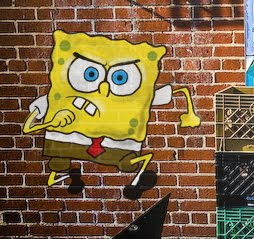 Sponge Graffiti On Brick Wall