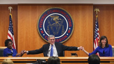 FCC Commissioners Approving Net Neutrality Ruling.