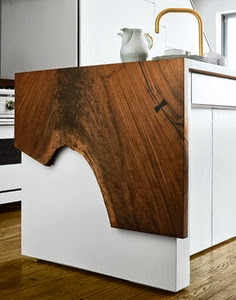 white cabinets, natural wood, waterfall counter 