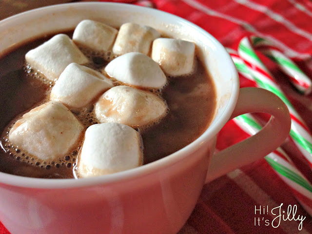 This Delicious Crockpot Hot Chocolate from Hi! It's Jilly would be perfect on a cold, winter day or at a holiday party! 