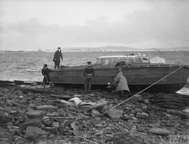 Attempting to rescue a ship stranded by a storm in Scapa Flow on 5 January 1942 worldwartwo.filminspector.com