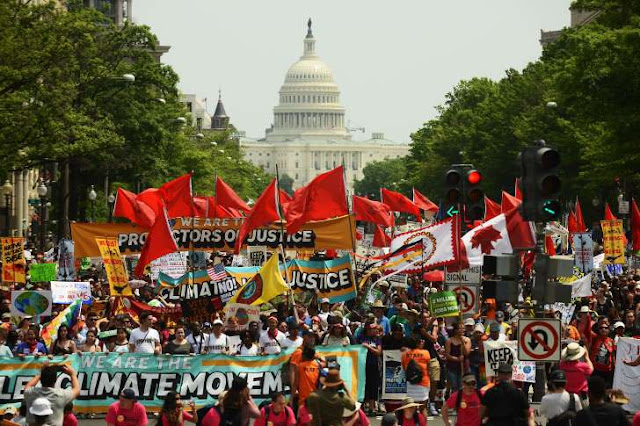 Climate March draws massive crowd to D.C. in sweltering heat