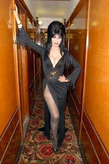 Elvira in hallway