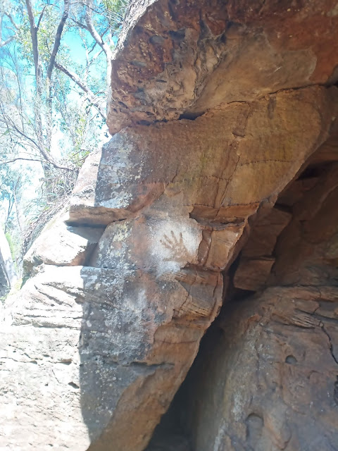 Indigenous Australian handprint on cave wall