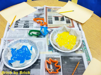 Painting with cookie cutters (Brick by Brick)