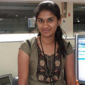 Beautiful and enthusiastic young Tamil girl wearing traditional costumes.