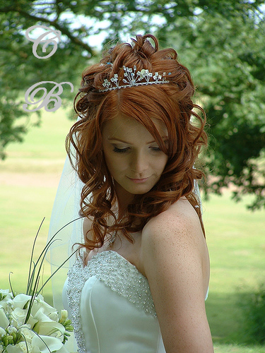 Tying into an updo and decking it with white ivory also can be done or else