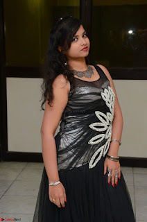Shrisha Dasari in Sleeveless Short Black Dress At Follow Follow U Audio Launch 061.JPG