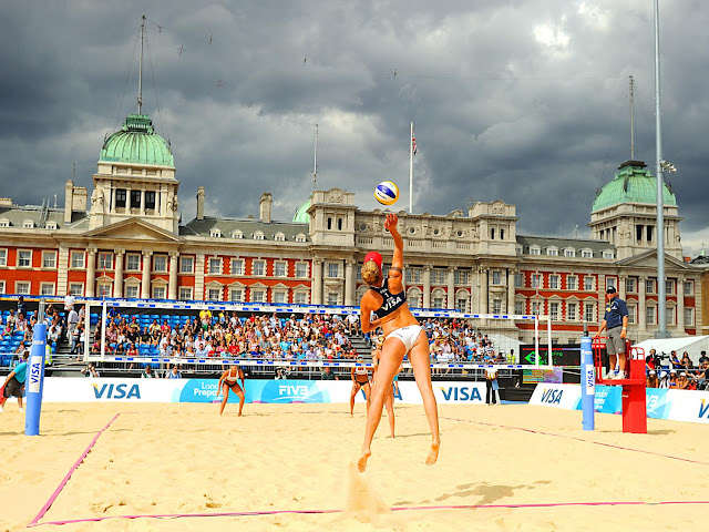 Jennifer Kessy and April Ross of the US take on Brazil's Angela Viera and
