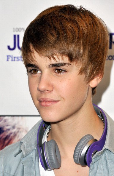 bieber haircut for girls. Young girls swoon, buy concert