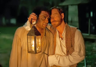 Michael Fassbender as Edwin Epps, Chiwetel Ejiofor as Solomon Northup, in 12 Years a Slave, directed by Steve McQueen