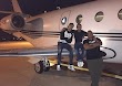 Cristiano Ronaldo poses with friends on the wing of his private jet
