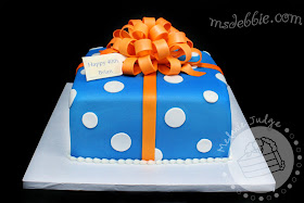 blue orange white gift cake bow