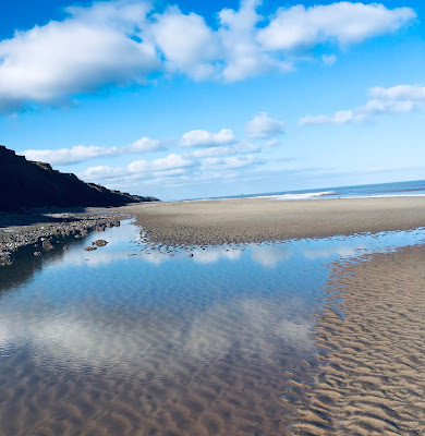 Reflected clouds by Jill Webb