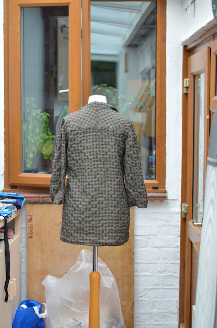 Back of a blouse on a mannequin