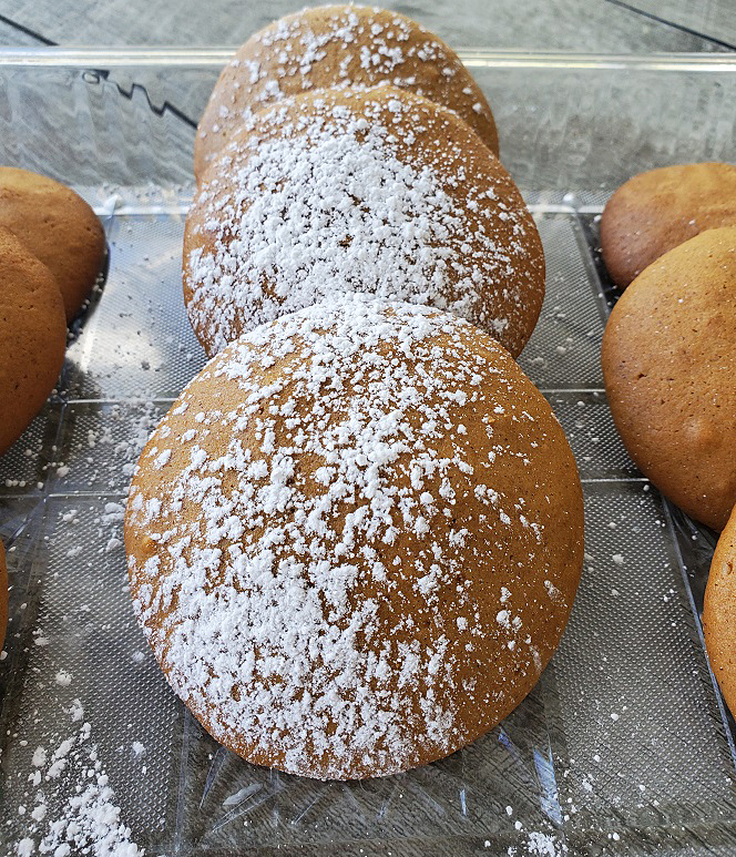 this is a wine drop cookie made with molasses very soft and sprinkled with powdered sugar