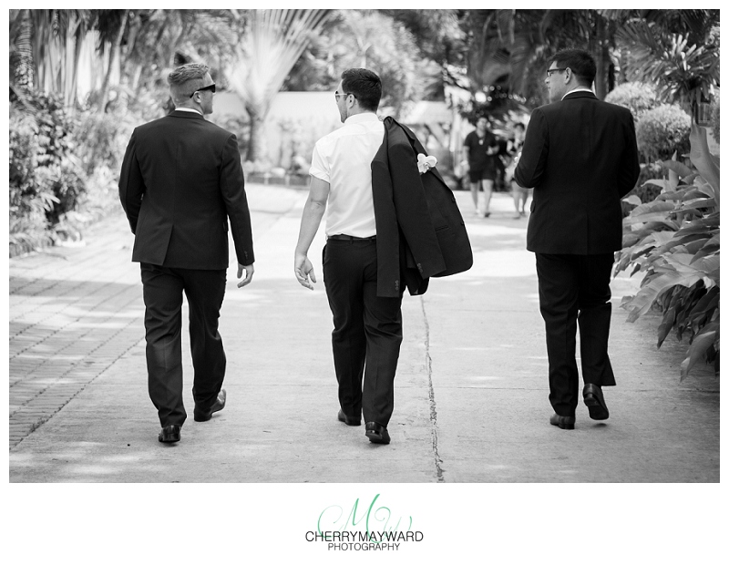 groom and groomsmen walking, black and white, Koh Samui, Thailand wedding