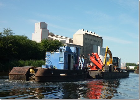 2 crt barge pushes digger