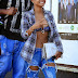 Fashionburs: Christina Milian goes out Showing off Bra and Flat Belly with her Shirt ripped Open