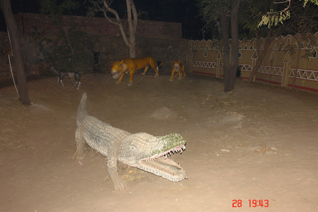 Photo of Life-life crocodile inside the tourist village of Chokhi Dhani