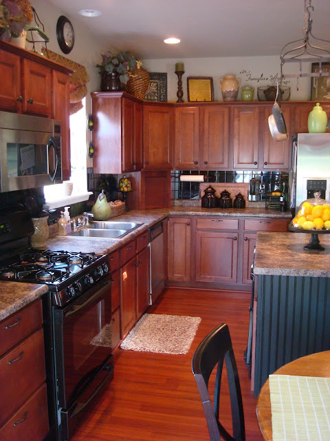 dark cabinets black backsplash