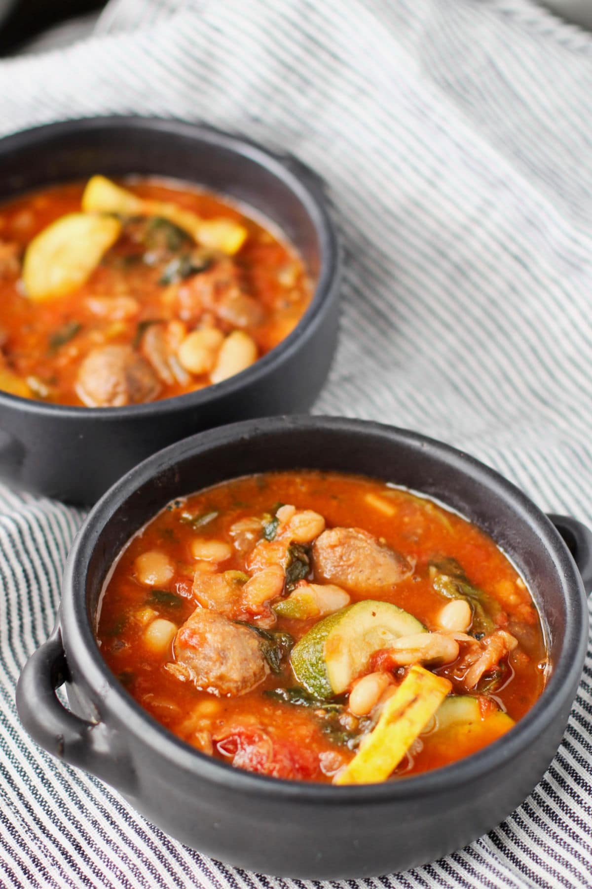 Sausage, Vegetable, and Bean Soup in a bowl.